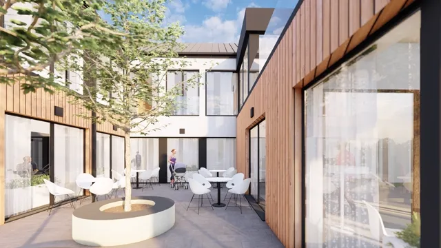 Architektonická vizualizace v galerii Města a obce — venkovní posezení se stoly, židlemi a stromem mezi prosklenými fasádami