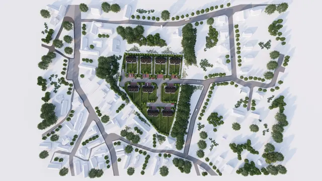 Pohled shora na 3D model obytného souboru dvojdomů se zahradami a obslužnou komunikací v okolní zástavbě